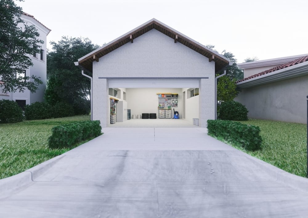 a beautiful garage with concrete driveway at mackay concreters